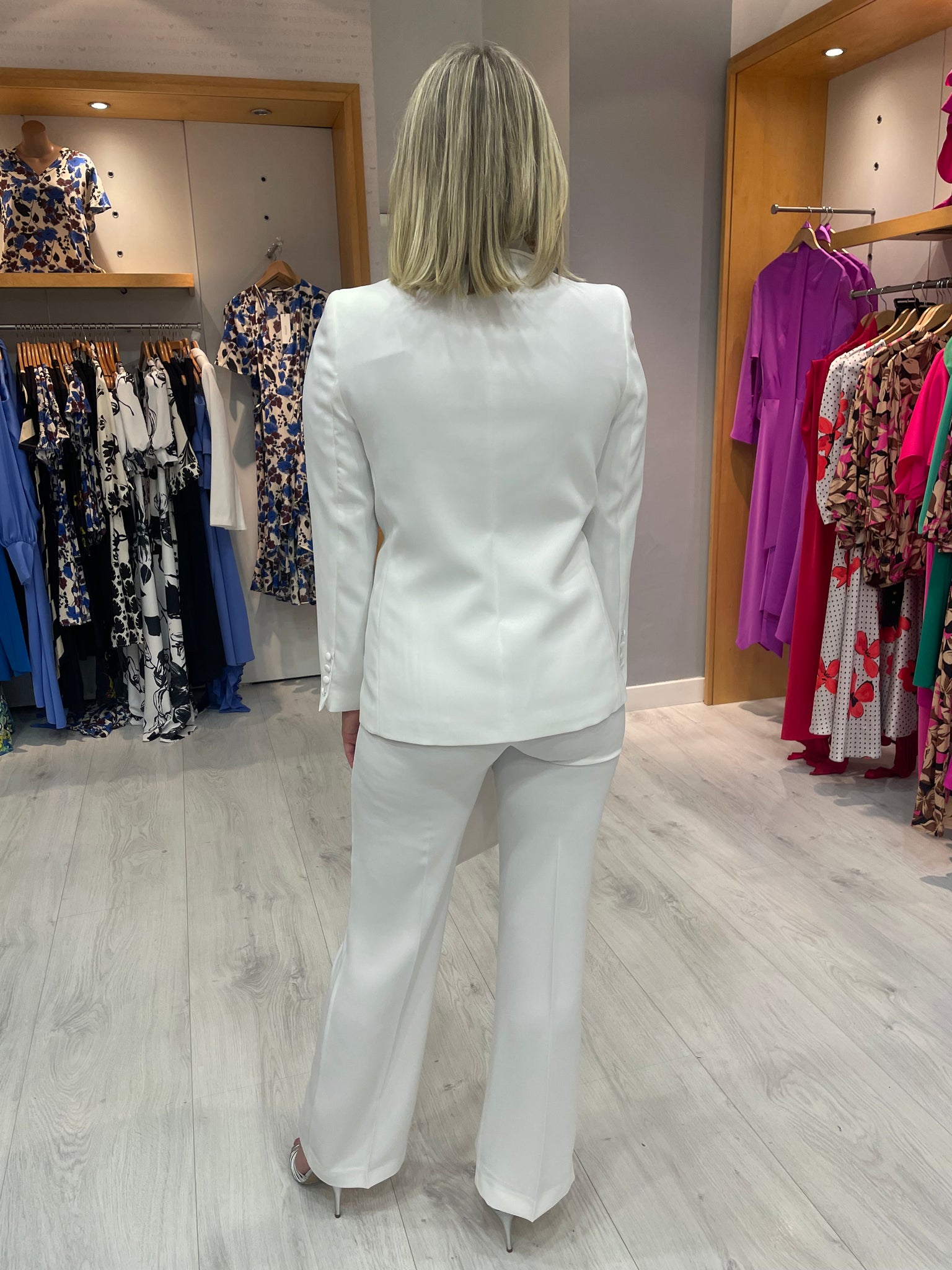 Carla Ruiz White Suit